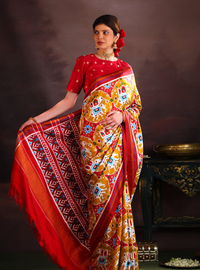 Patan Patola Mustard Shade And Red Silk Saree