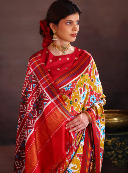 Patan Patola Mustard Shade And Red Silk Saree