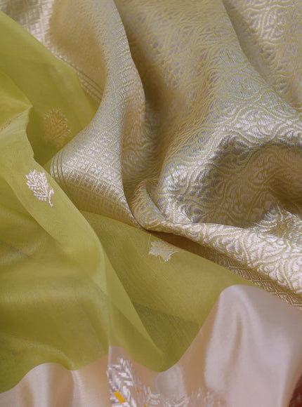 Pista Green & Cream Banarasi Kora Saree With Zari Buttas & Long Rich Border