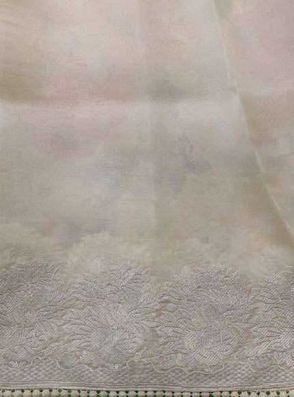 Beige Organza Silk Saree With Allover Prints & Rich Zari Border