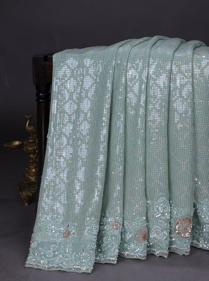 Teal Georgette Sequins Saree