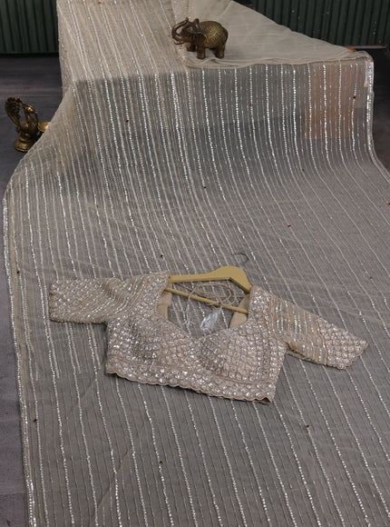 Beige Netted Designer Saree With Embroidery Readymade Blouse