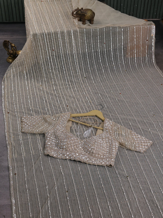 Beige Netted Designer Saree With Embroidery Readymade Blouse