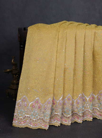Yellow Tissue Embroidery Saree