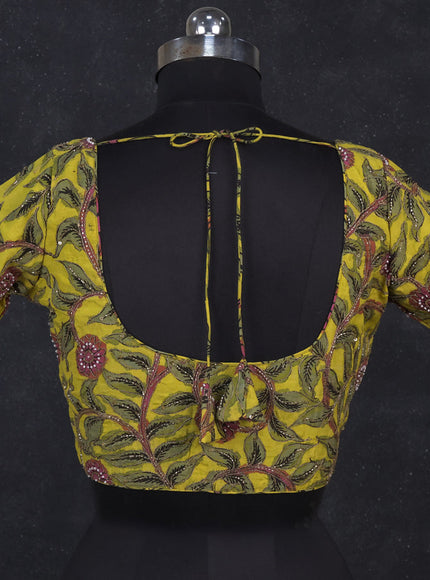 Silk penkalamkari readymade blouse lime yellow with allover kalamkari prints & pita work and back knot
