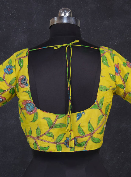 Silk penkalamkari readymade blouse lime yellow with allover kalamkari prints & pita work and back knot