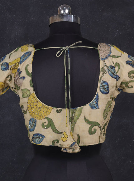 Silk penkalamkari readymade blouse cream with allover kalamkari prints & pita work and back knot