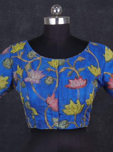 Silk penkalamkari readymade blouse blue with allover kalamkari prints & pita work and back knot
