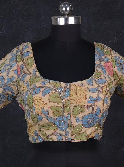 Silk penkalamkari readymade blouse cream with allover kalamkari prints & pita work and back knot
