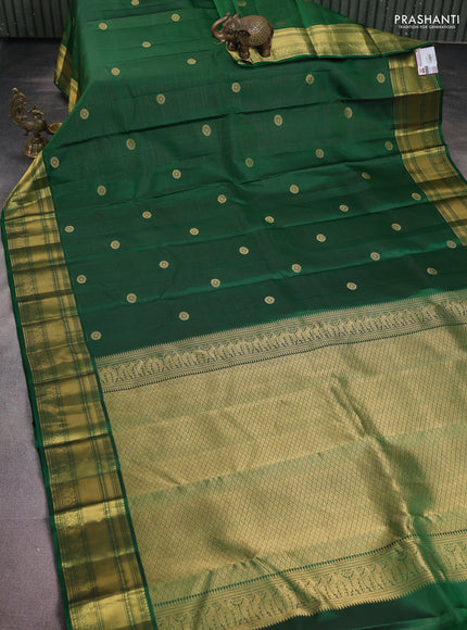 Pure kanchipuram silk saree green with allover zari weaves & buttas and zari woven border