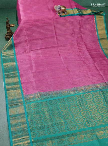 Kuppadam silk cotton saree light pink and teal green with allover laksha deepam weaves and zari woven border