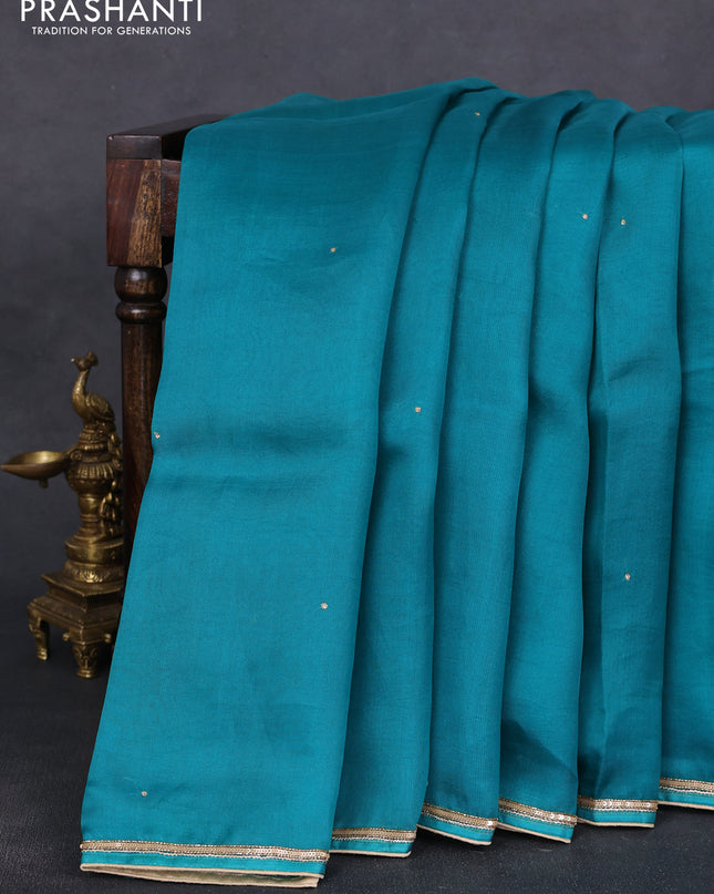 Pure organza silk saree teal green with embroidery zari buttas and sequin embroidered border