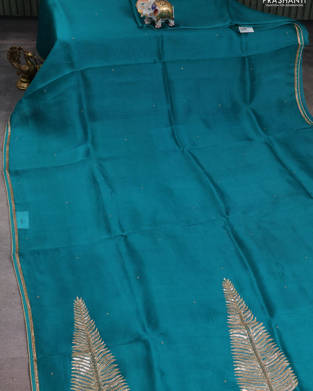 Pure organza silk saree teal green with embroidery zari buttas and sequin embroidered border