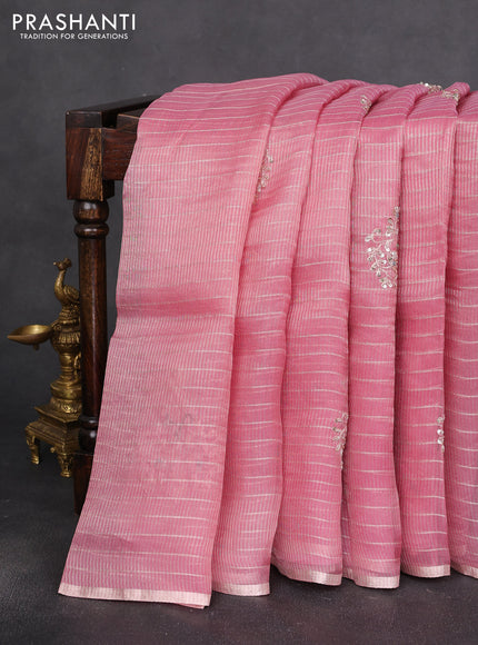Pure organza silk saree light pink with allover zari stripe pattern & zardosi work and zari woven piping border