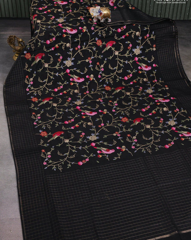 Semi tussar saree black with allover embroidery design and zari woven border