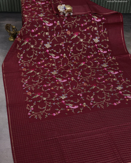 Semi tussar saree maroon with allover embroidery design and zari woven border