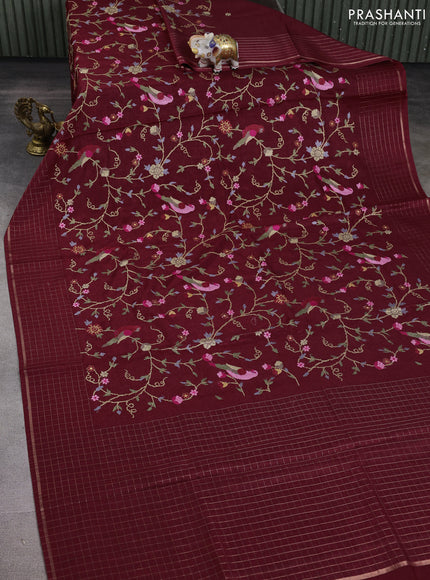 Semi tussar saree maroon with allover embroidery design and zari woven border