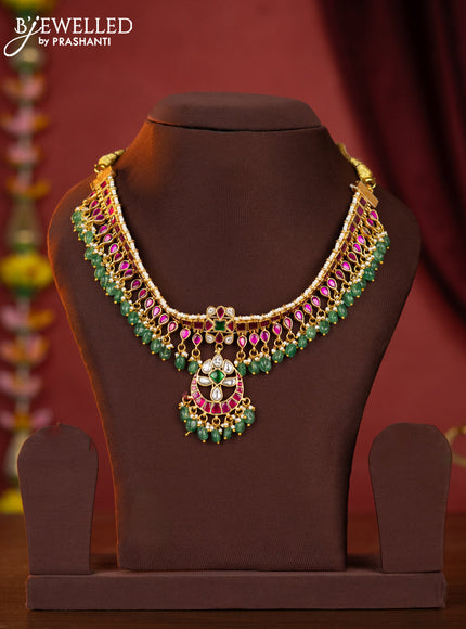 Jadau attigai necklace with jadau stones and green beads hanging