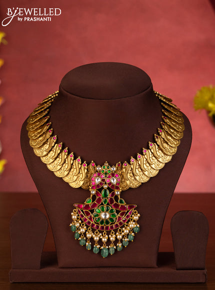 Jadau necklace lakshmi kasu design with jadau kundan stones and pearl & mint green beads