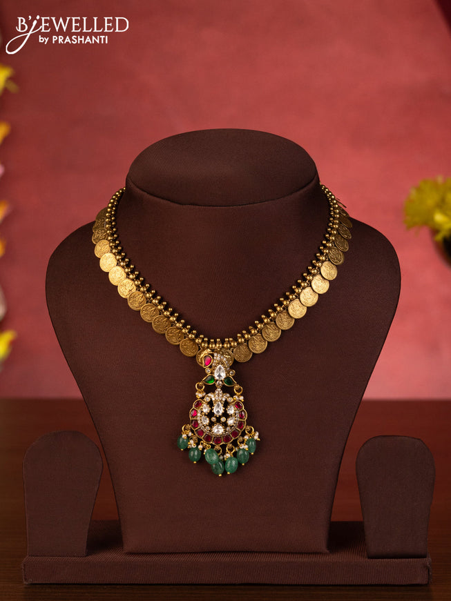Jadau necklace lakshmi kasu design with jadau kundan stones mint green beads
