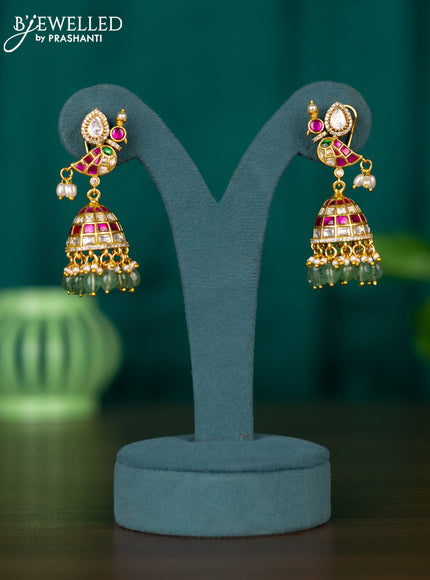 Jadau jhumkas birds design with jadau kundan cz stones and mint green beads hangings