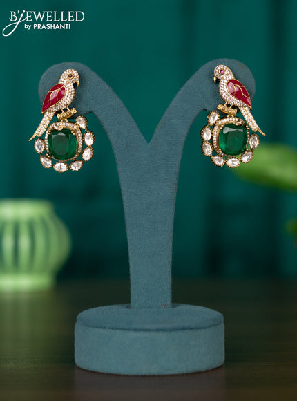 Earrings parrot design with emerald and moissanite stones in victorian finish