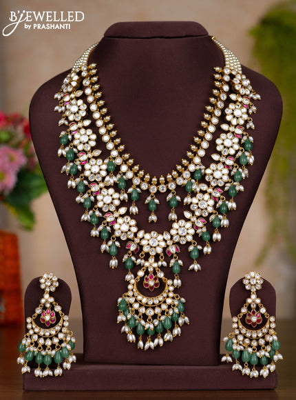 Jadau double layer haaram floral design with pink jadau kundan stones and pearl & green beads hangings