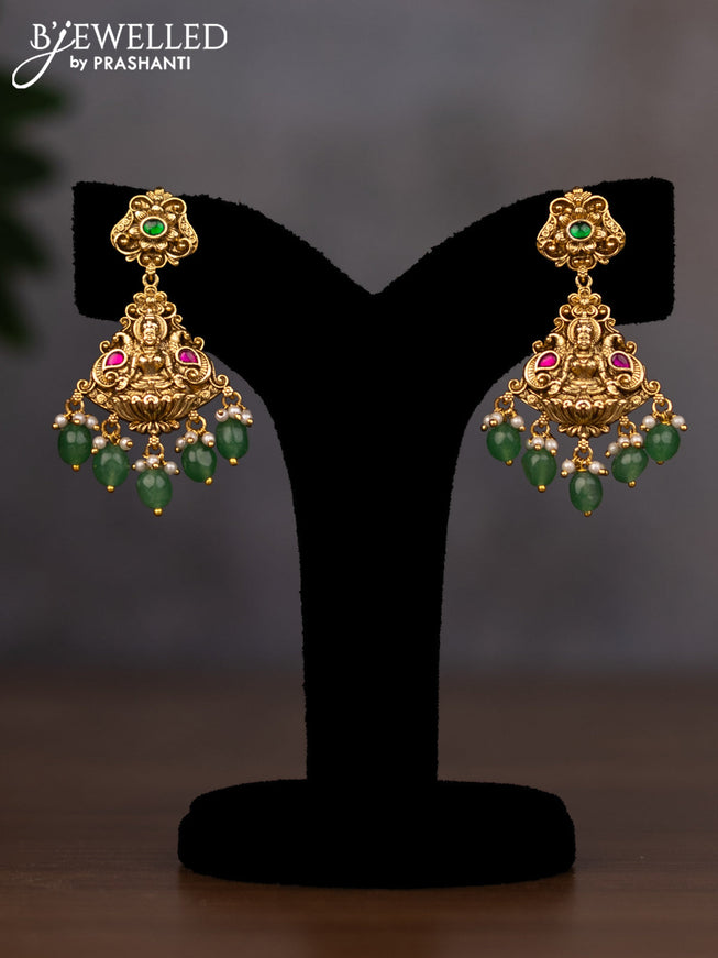 Antique necklace lakshmi design with jadau stones and green beads hanging
