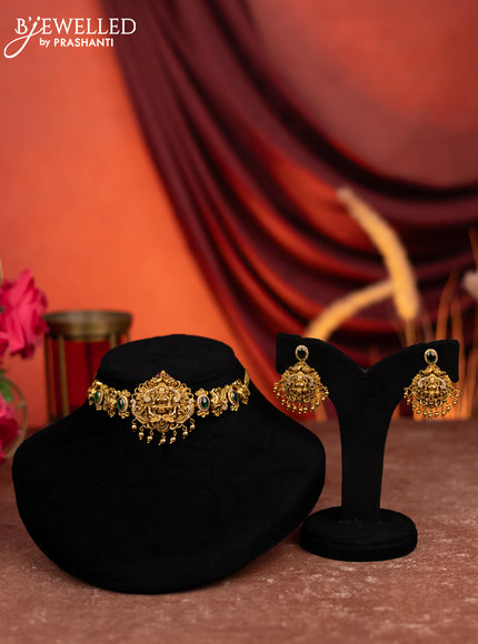Antique choker lakshmi design with kemp & cz stones and golden beads hangings