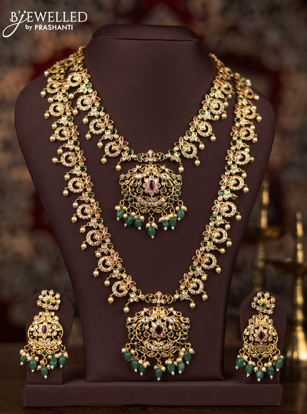 Antique combo set with kemp & cz stones and pearl & green beads hangings