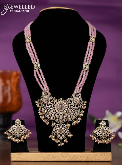 Beaded triple layer baby pink necklace with kundan & cz stones and pearl & beads hangings