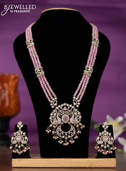 Beaded triple layer baby pink necklace peacock design with kundan & cz stones and pearl & beads hangings