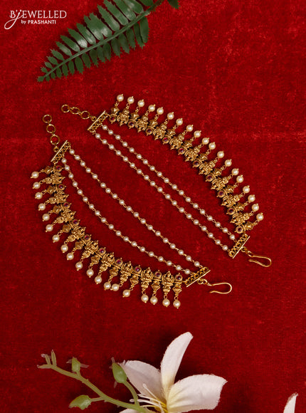 Antique triple layer mattal lakshmi design with ruby stones and pearl hangings