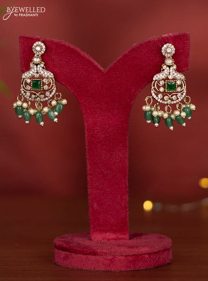 Necklace with emerald & kundan cz stones and green beads hangings in victorian finish