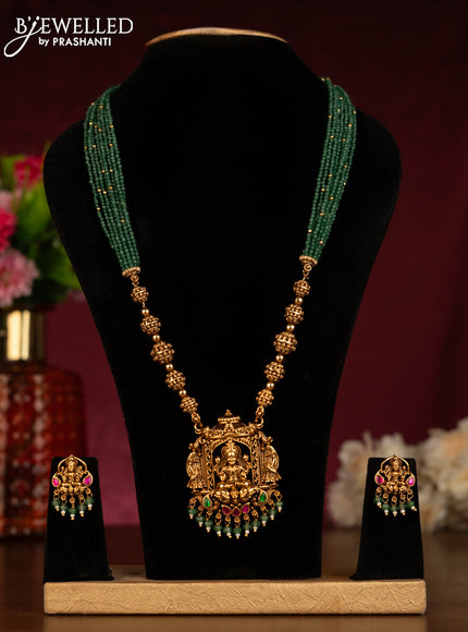 Beaded haaram with lakshmi pendant in jadau stones and green beads hangings