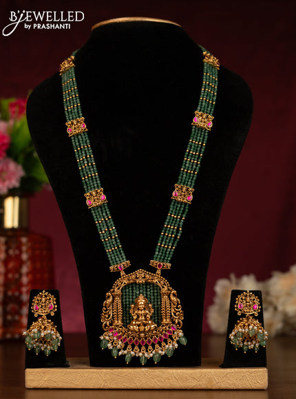 Beaded haaram with lakshmi pendant in jadau stones and green beads hangings