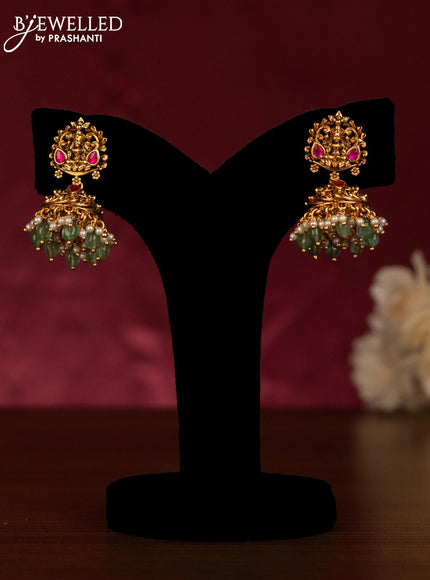 Beaded haaram with lakshmi pendant in jadau stones and green beads hangings