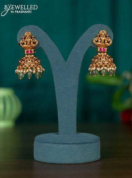 Antqiue jhumka with lakshmi design in jadau stones and green beads hanging