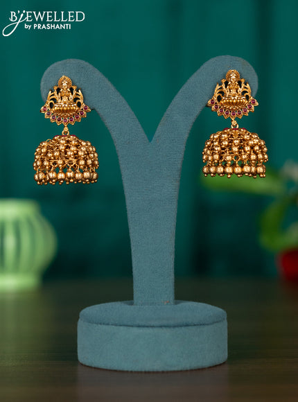 Antqiue jhumka with lakshmi design in kemp and gold beads hanging