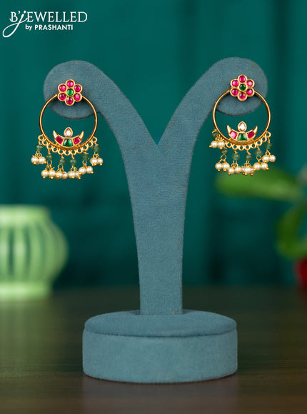Antique earring with floral design in jadau stones and pearl hanging