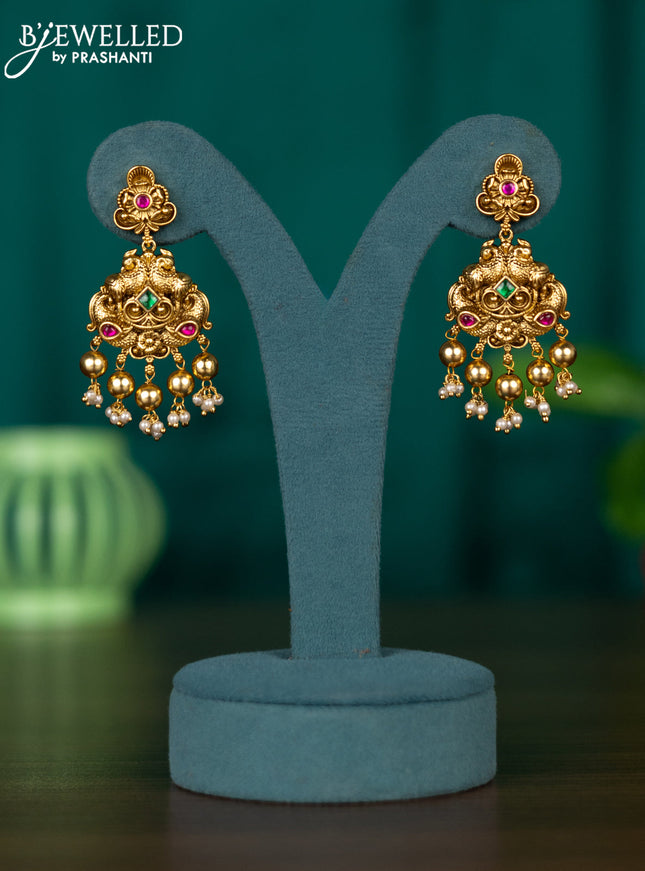 Antique earring floral design in jadau stones with golden beads hanging
