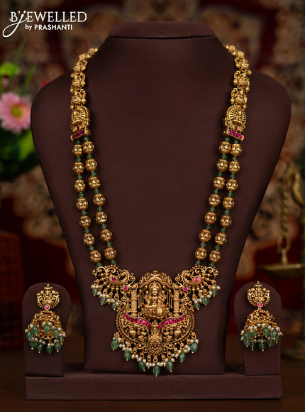 Antique haaram with double layer lakshmi pendant with kemp stones and green beads hanging