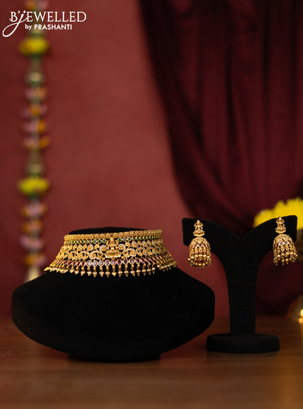Antique choker lakshmi design with kemp and green stones and golden ball hanging