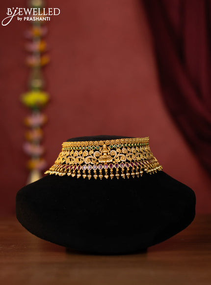 Antique choker lakshmi design with kemp and green stones and golden ball hanging