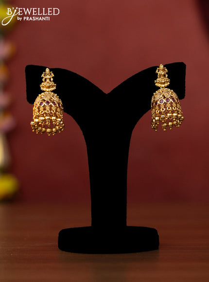 Antique choker lakshmi design with kemp and green stones and golden ball hanging