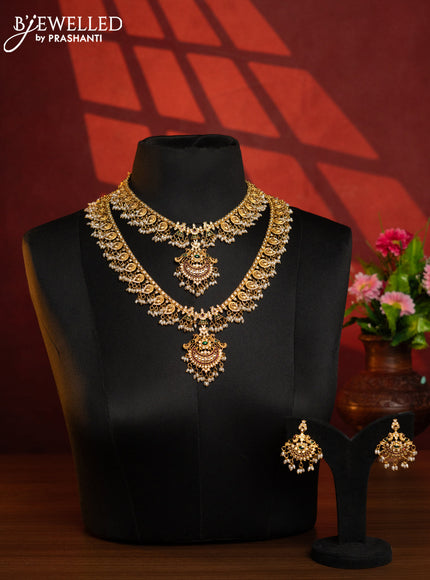 Antique guttapusalu combo set with double peacock design with kemp and white stones and rice pearl hanging