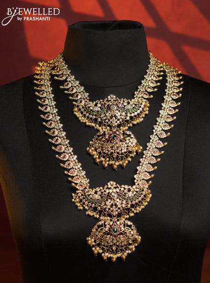 Antique combo set in maanga desogn with white and kemp stones and golden ball hanging