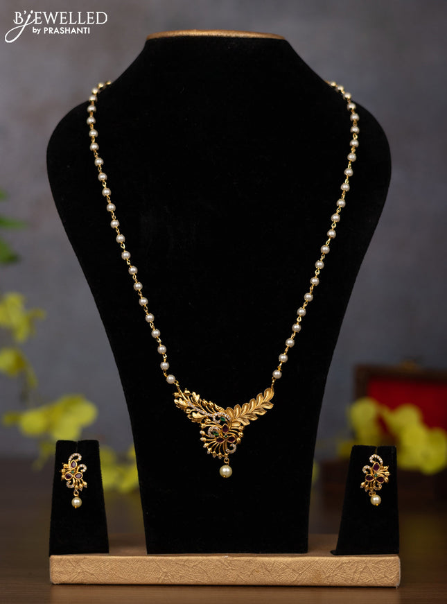 Antique earring with kemp pachi kundan stones and pearl & green beads hanging