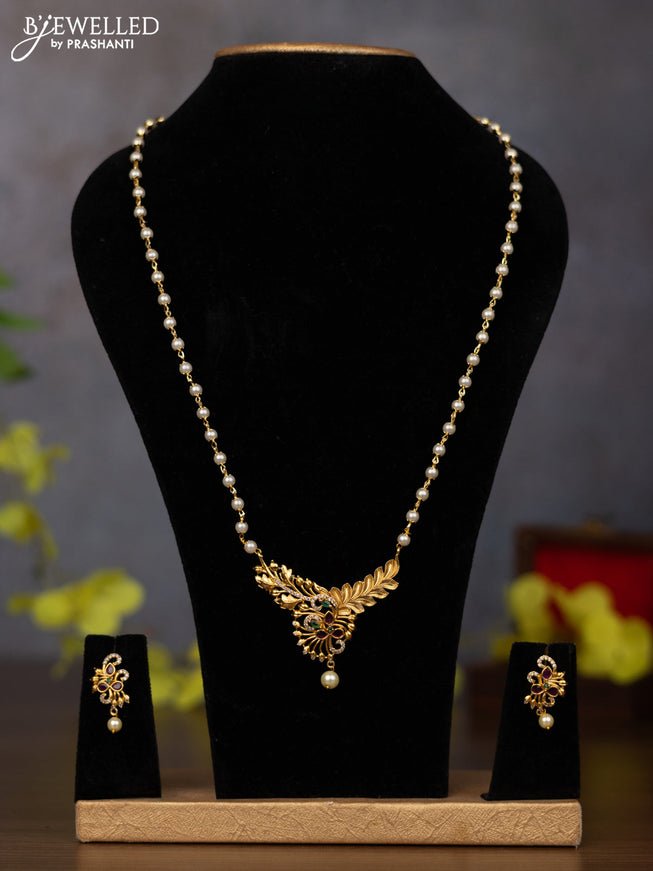 Antique earring with kemp pachi kundan stones and pearl & green beads hanging