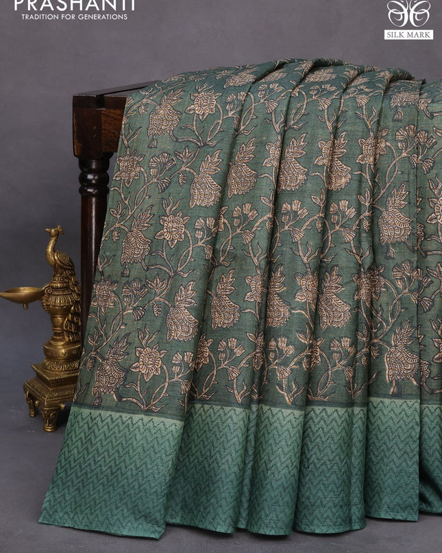 Pure tussar silk saree green shade with allover floral prints and printed border